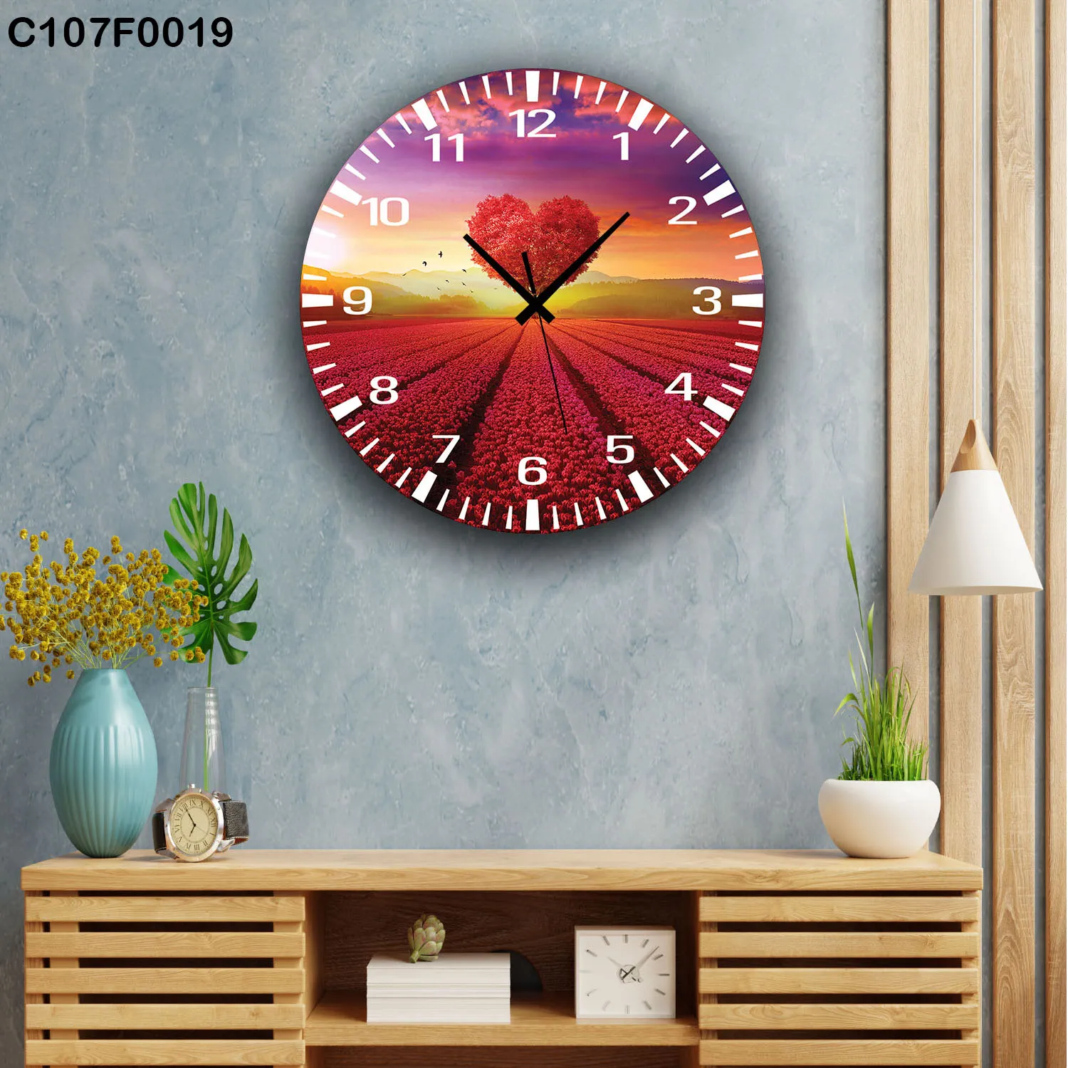ساعة دائرية قلب أحمر حقل زهور عند غروب